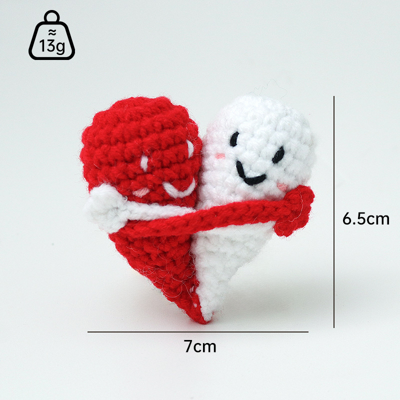 Cute handmade crocheted positive energy doll heart hug emoji pack, a knitted gift for couples.